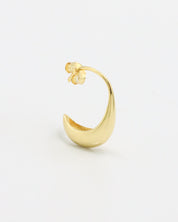A pair of small gold-colored hoop earrings with a modern design.