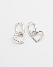 A pair of silver hoop earrings with a hinged clasp mechanism on a white background.