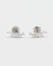 A pair of silver stud earrings with a butterfly clasp, featuring a intricate pattern.