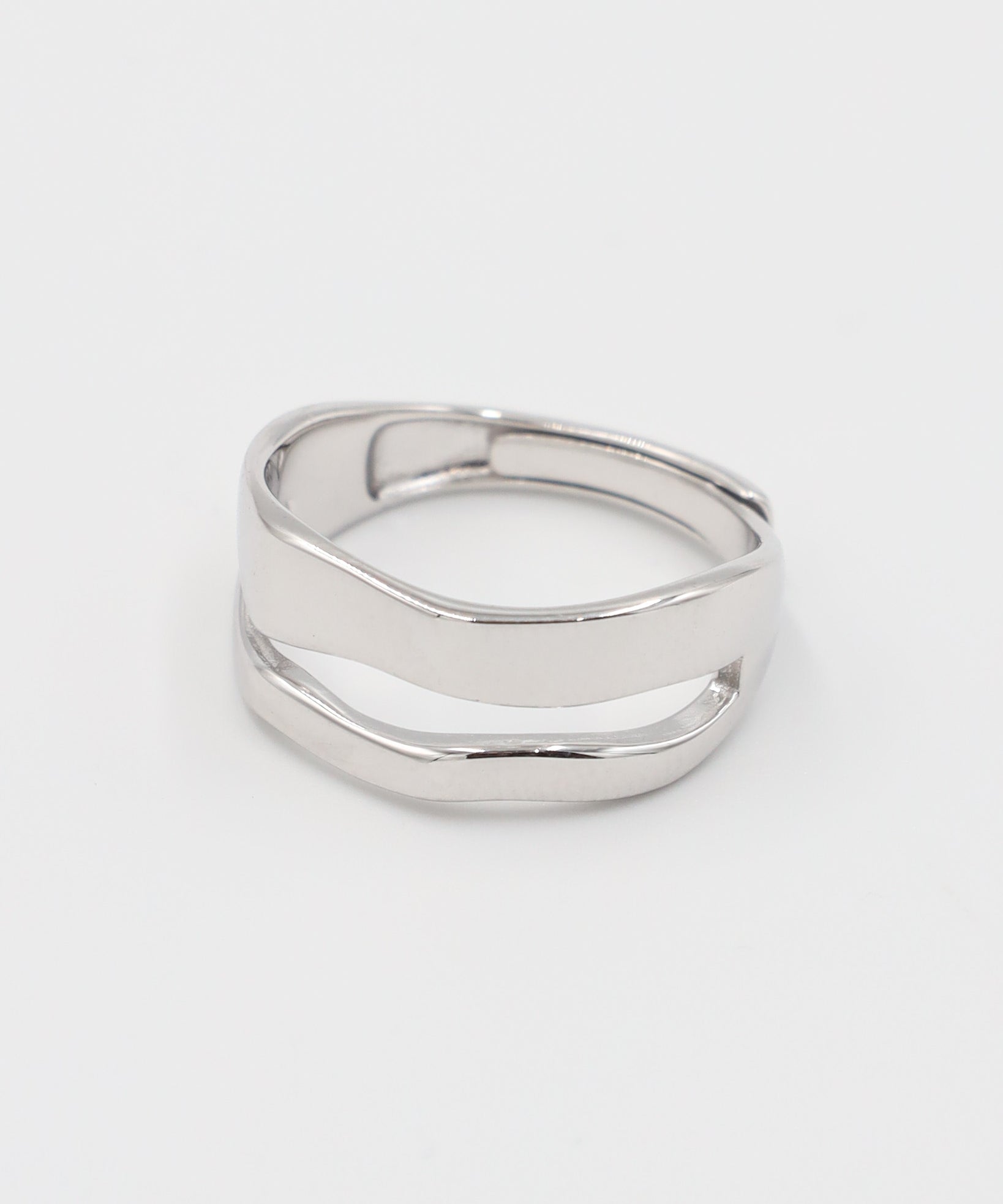 A simple silver ring with a smooth, flat surface and no visible brand marking.