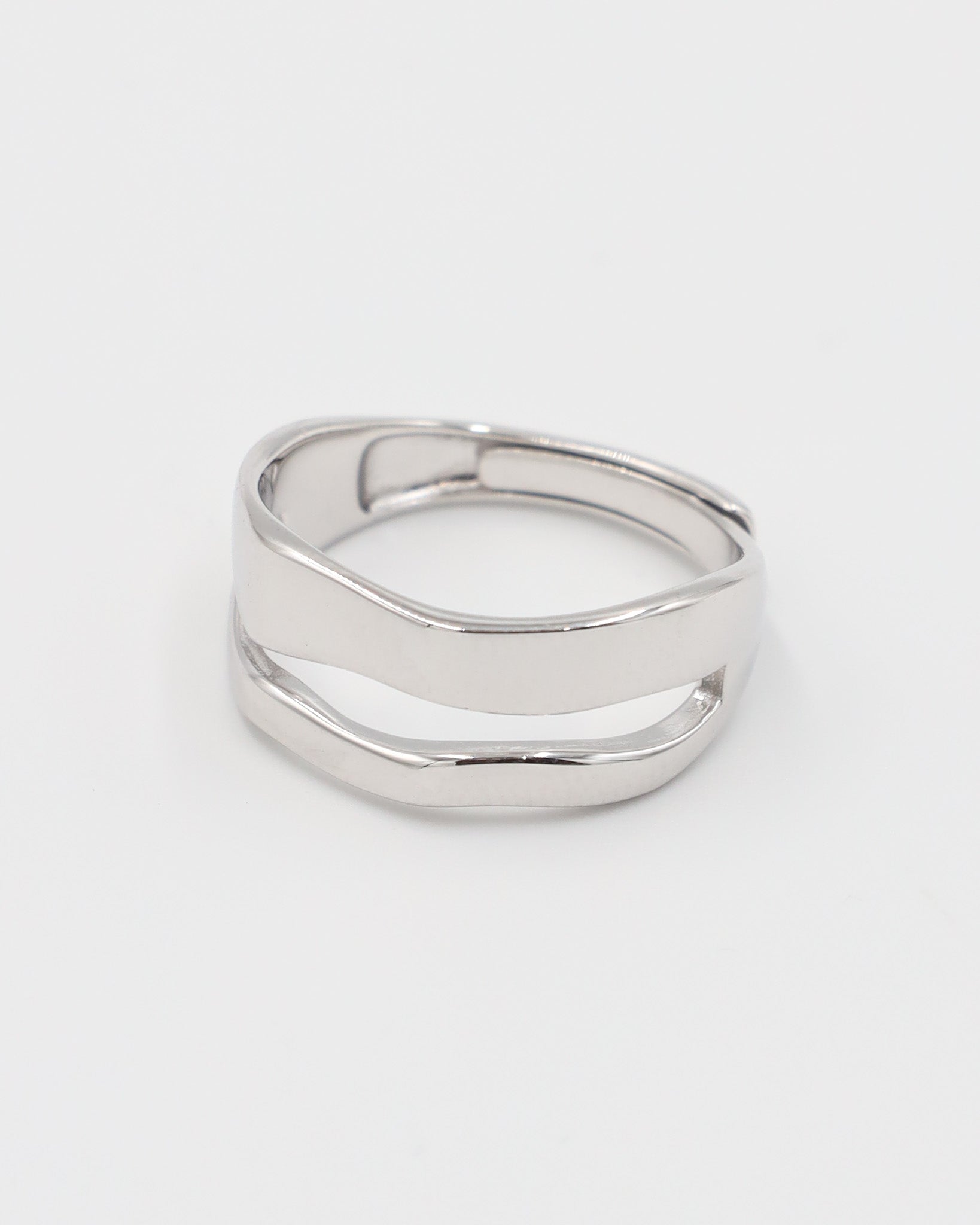 A simple silver ring with a smooth, flat surface and no visible brand marking.
