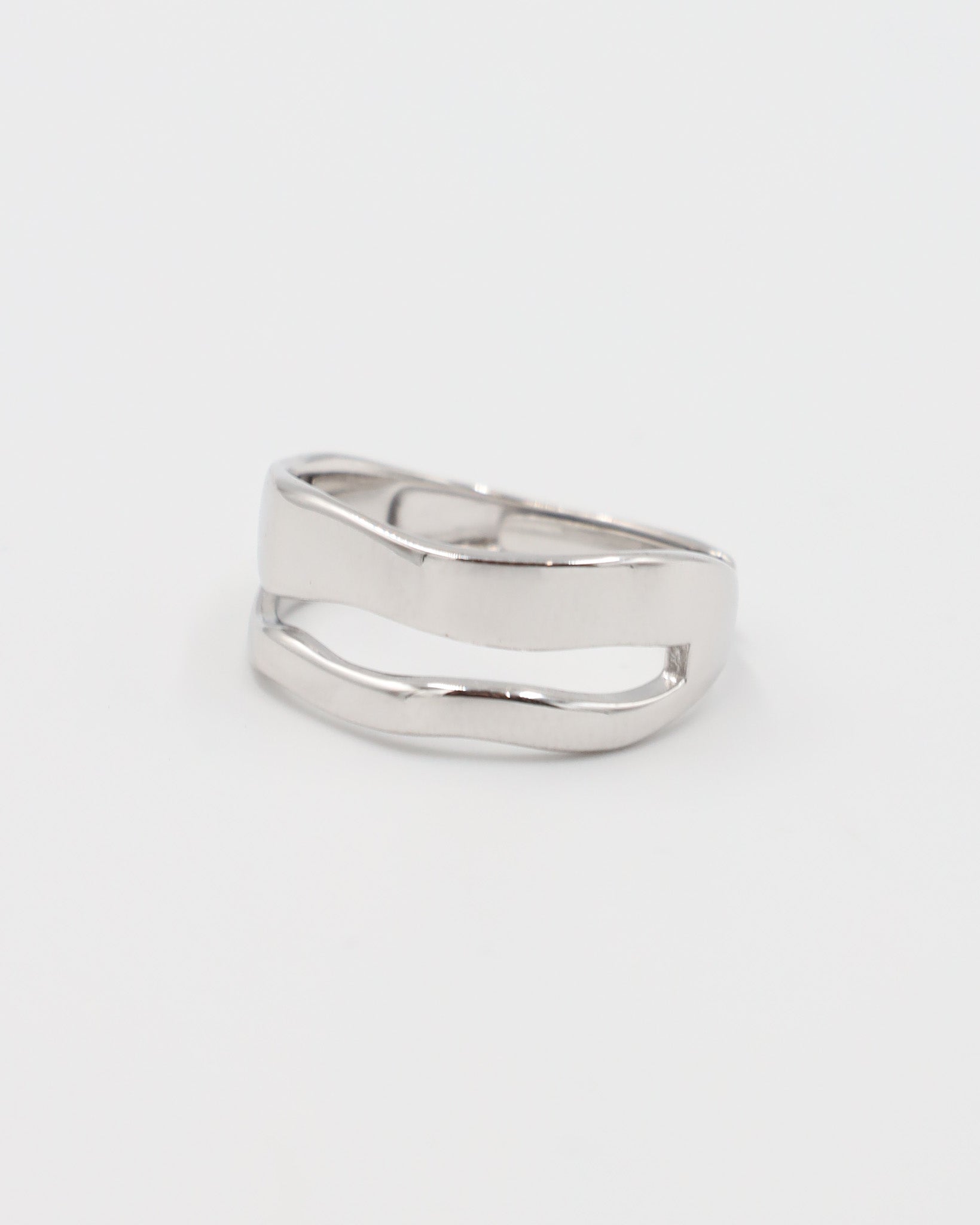 A simple silver ring with a smooth, flat surface and no visible brand marking.