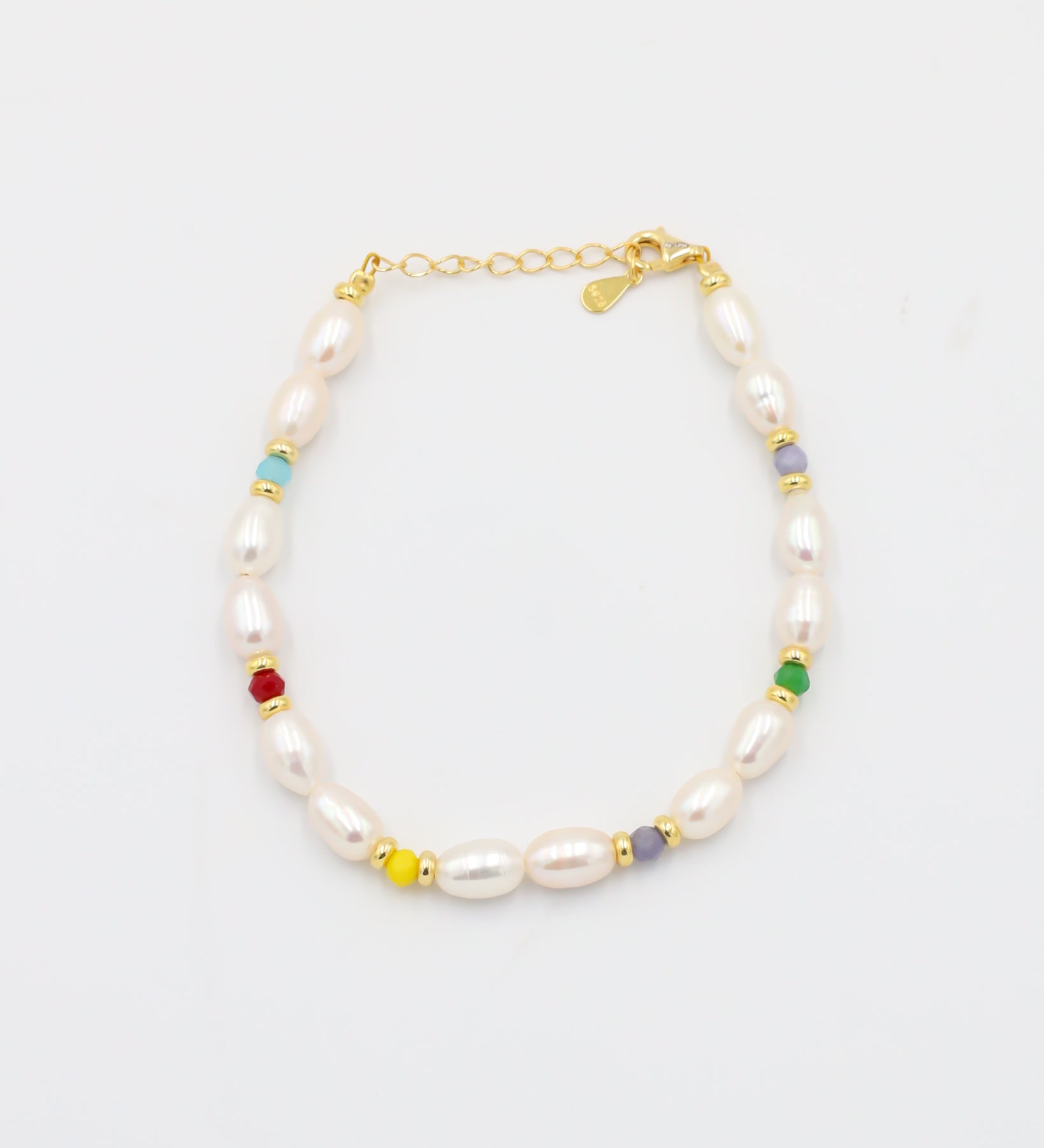 Adjustable gold-plated sterling silver pearl bracelet with colorful beads, Moe Gold, top view.