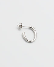 A pair of silver hoop earrings with a butterfly clasp closure on a white background.