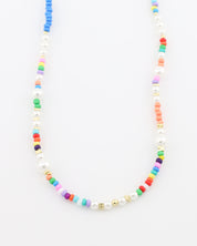 Colorful beaded necklace on a white background