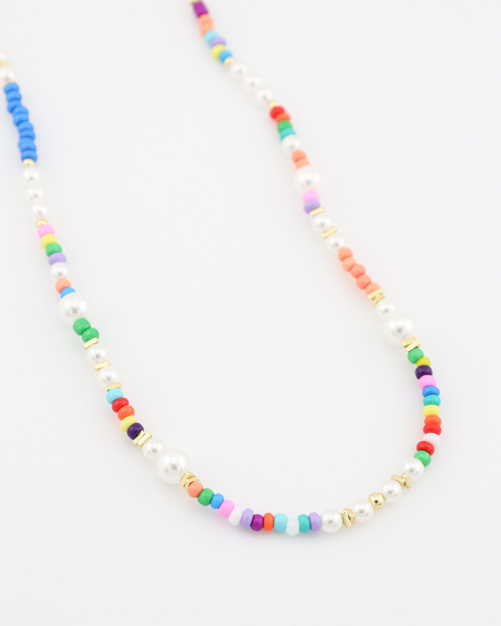 Necklace with multicolored beads on a white background