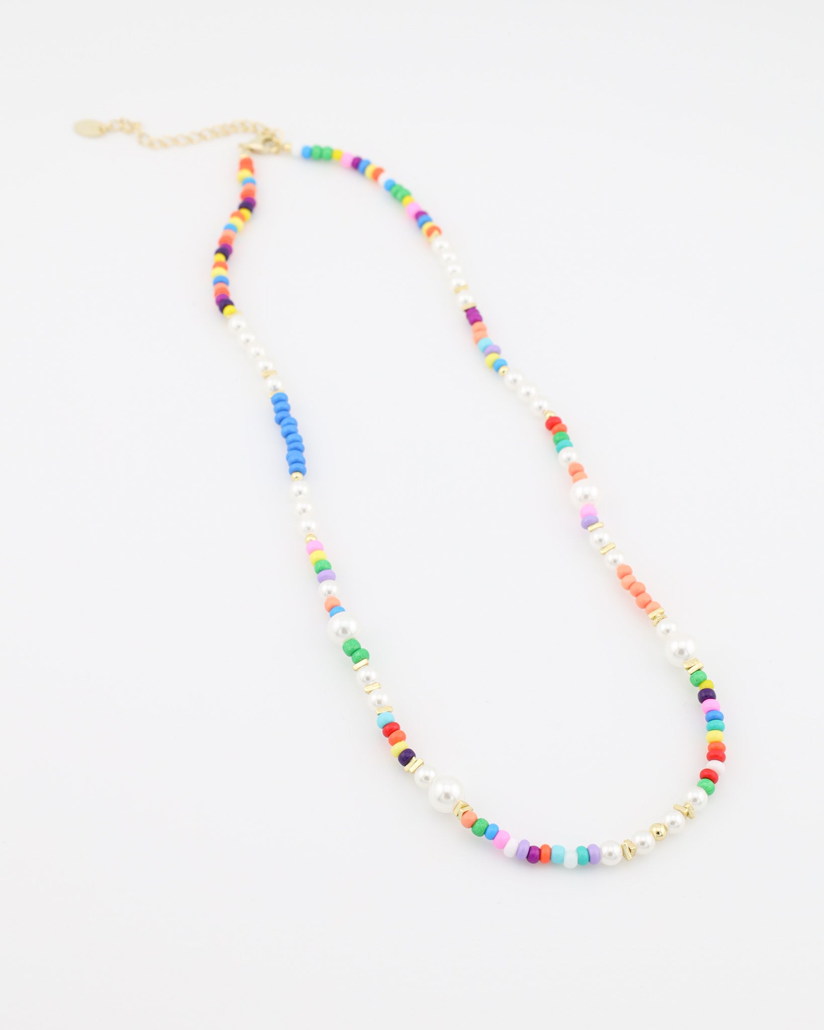 Colorful beaded necklace on a white background