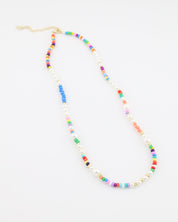 Colorful beaded necklace on a white background
