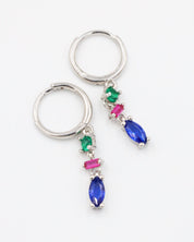 Pair of Phoebe sterling silver earrings with blue, pink, and green stones, shown in a flat lay.