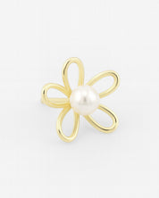 Gold flower-shaped earring with a pearl center on a light gray background
