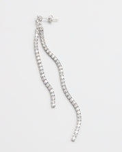 Silver earring with dangling crystal embellishments.