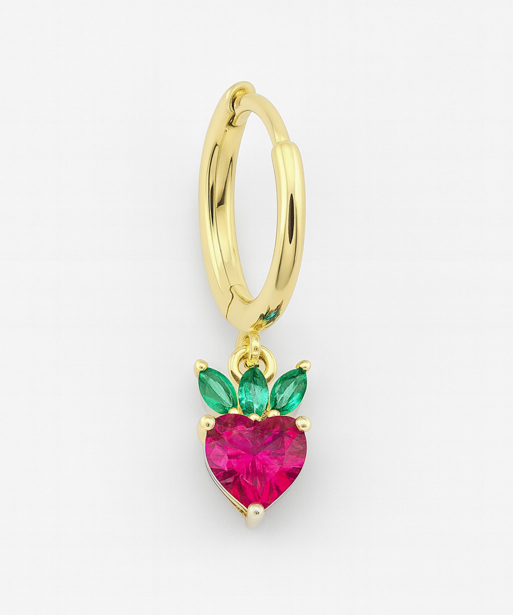 Gold hoop earring with a heart-shaped pink gemstone and green accents on a white background