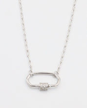 A silver necklace with a pendant featuring multiple stones in a geometric pattern.