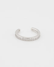 Silver bracelet with small stones on a white background