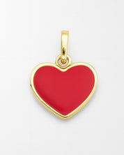 Gold heart-shaped pendant with red center on a white background