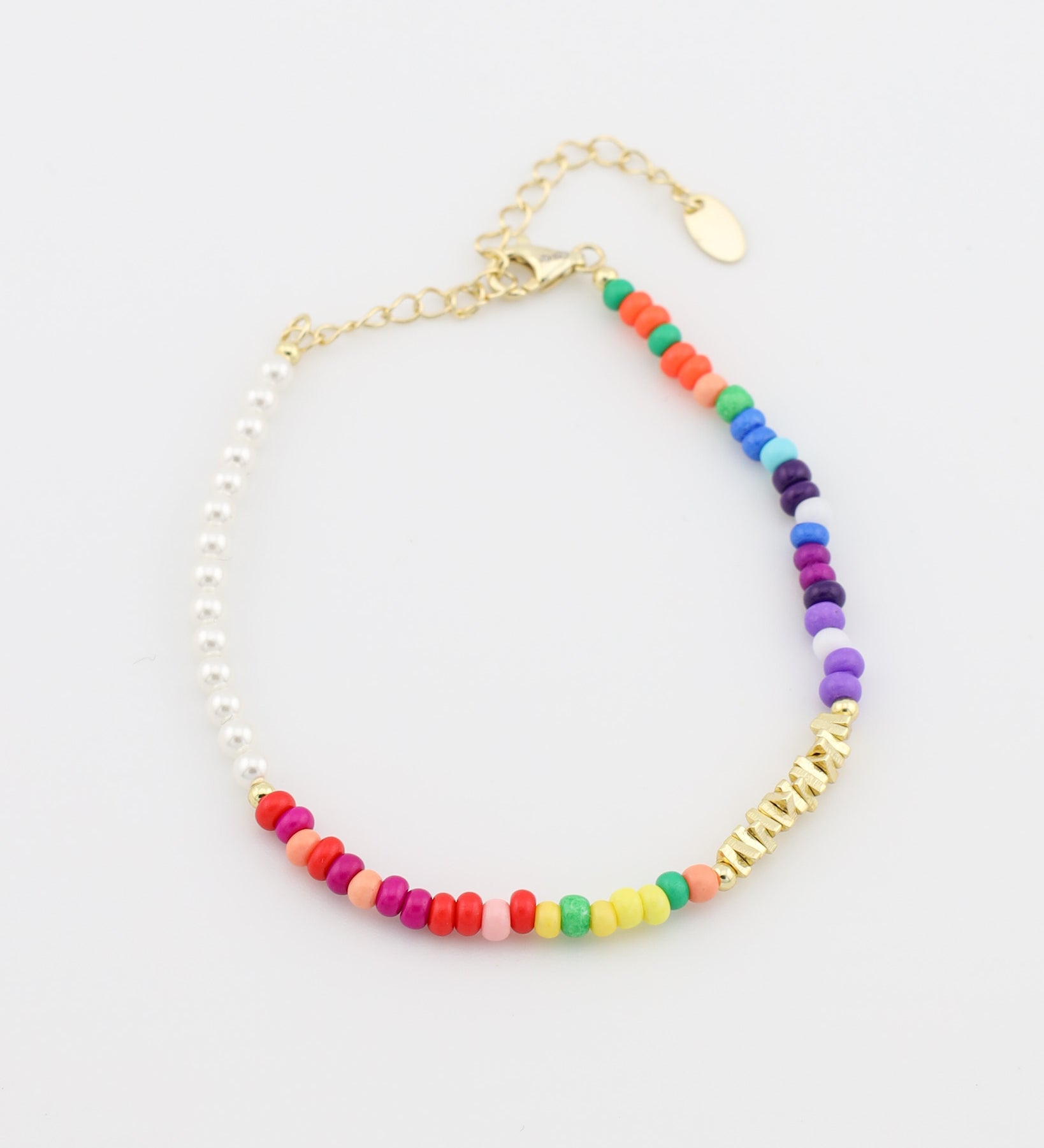 Multicolored beaded bracelet on a white background