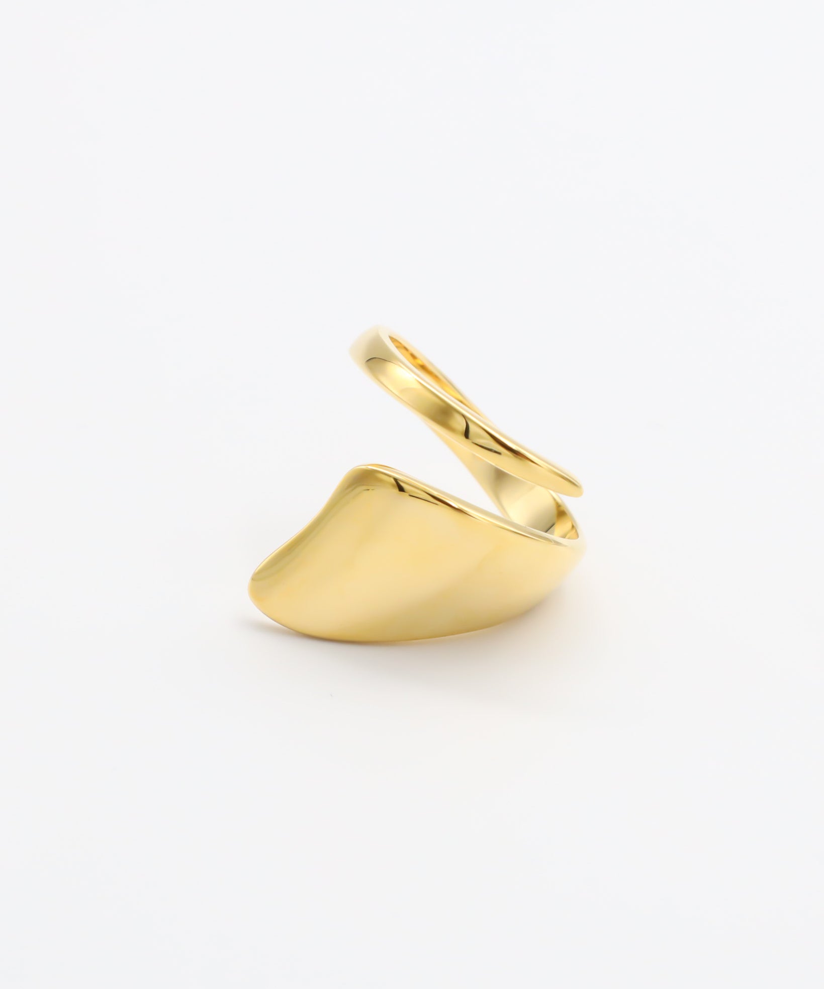 A single gold-colored ring on a white background.