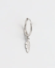A silver hoop earring with a feather charm attached, displayed against a white background.