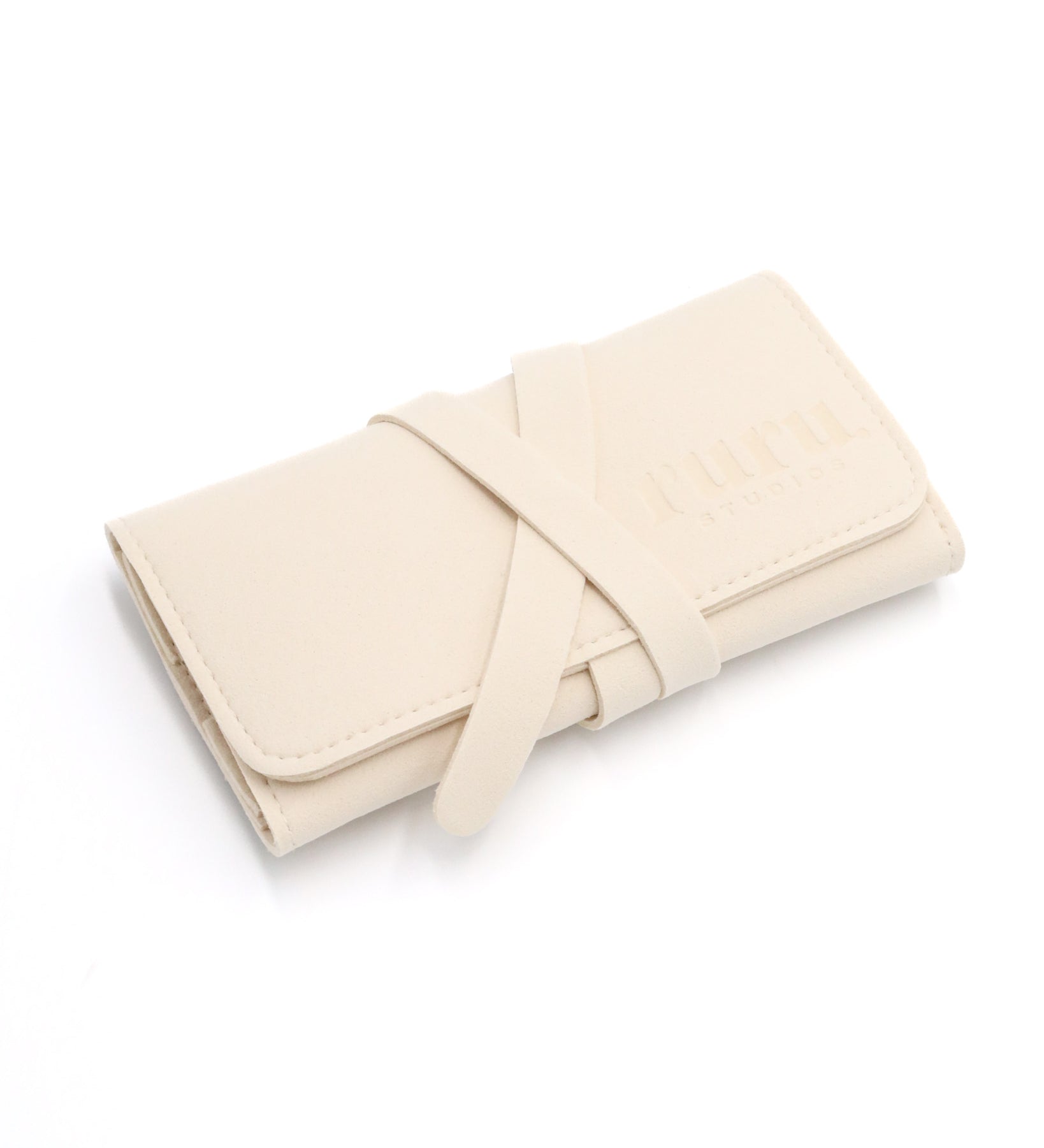 A beige travel case with a tie-up closure, designed for storing jewelry.