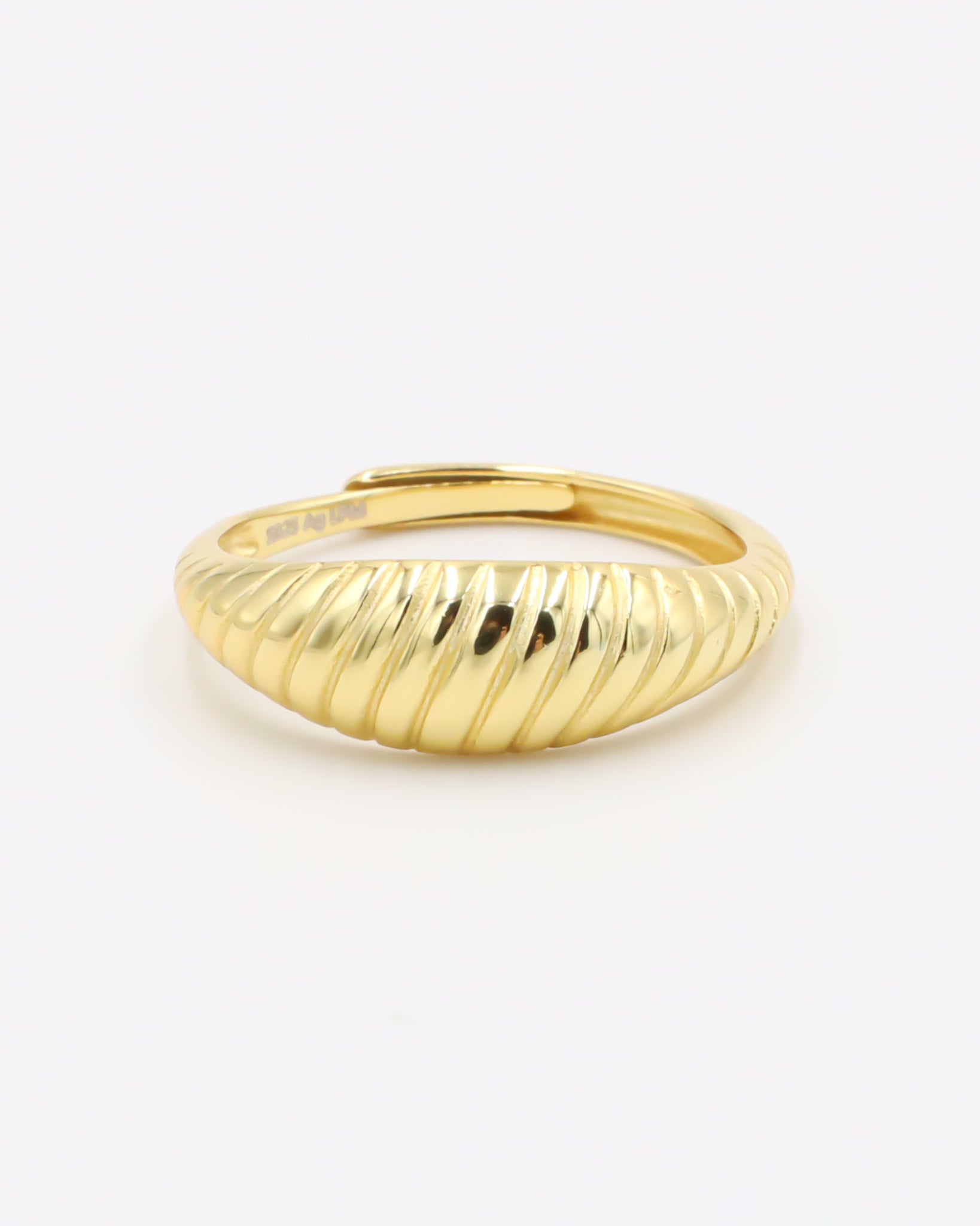 A gold-plated, recycled 925 sterling silver ring with a textured, adjustable band.