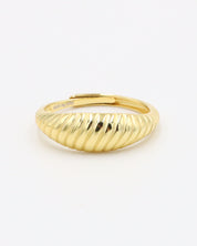 A gold-plated, recycled 925 sterling silver ring with a textured, adjustable band.