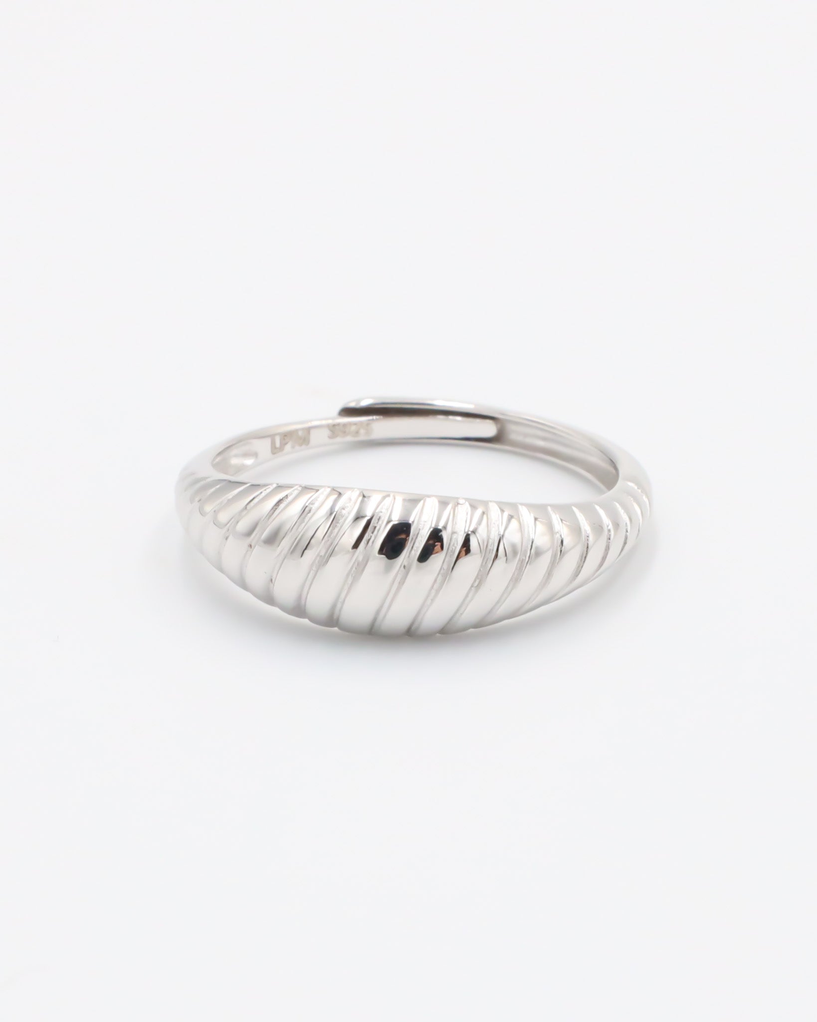 A rhodium-plated, recycled 925 sterling silver ring with a textured, adjustable band.