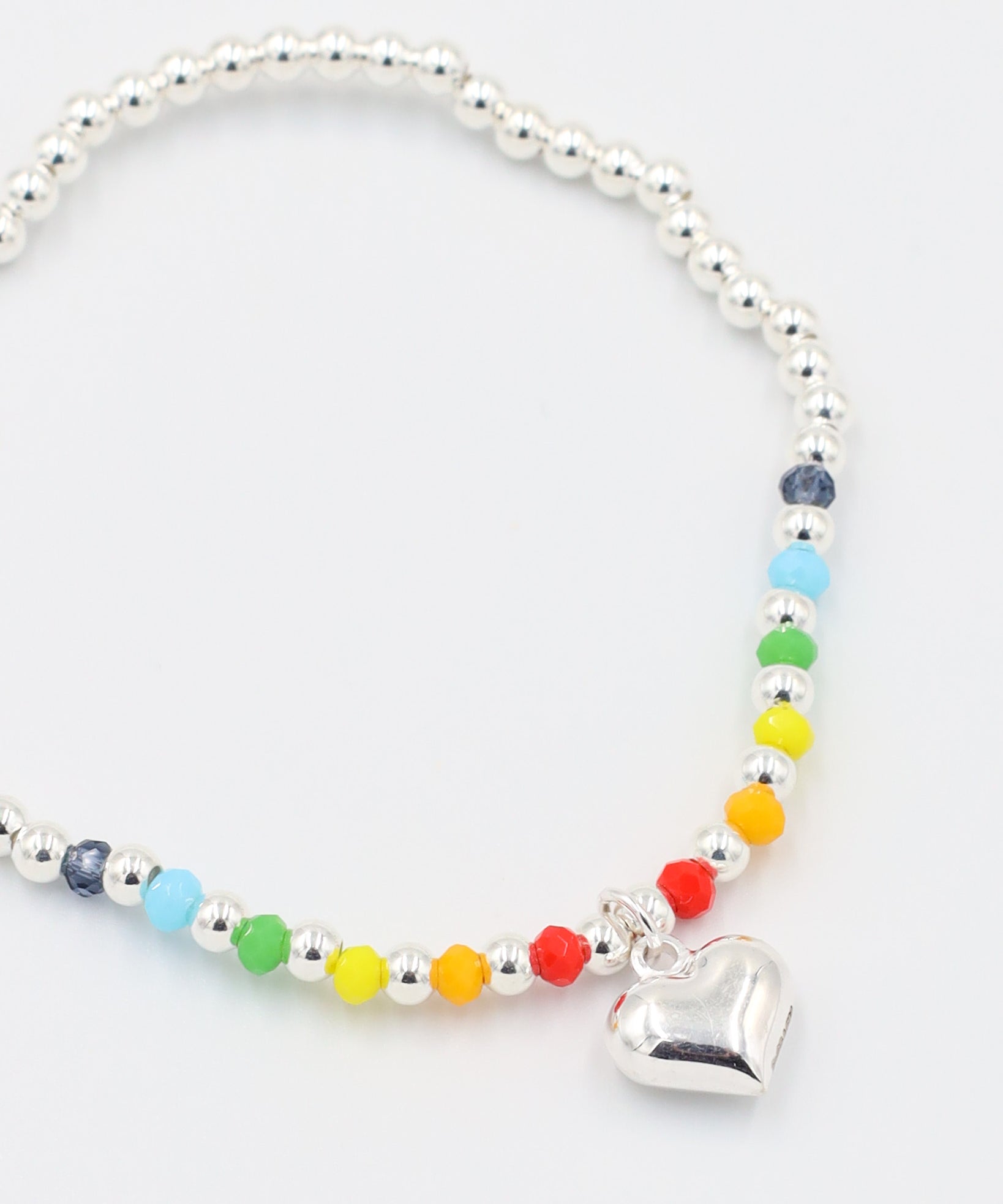 Detailed view of the Gayle Silver bracelet made of 925 sterling silver, featuring colorful beads and a heart charm.