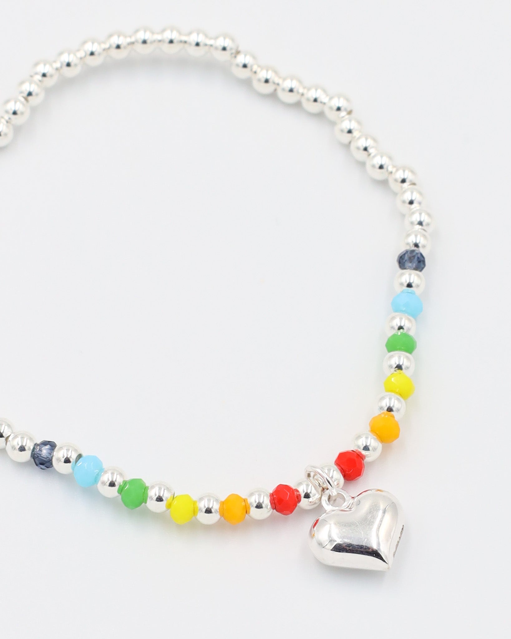 Detailed view of the Gayle Silver bracelet made of 925 sterling silver, featuring colorful beads and a heart charm.