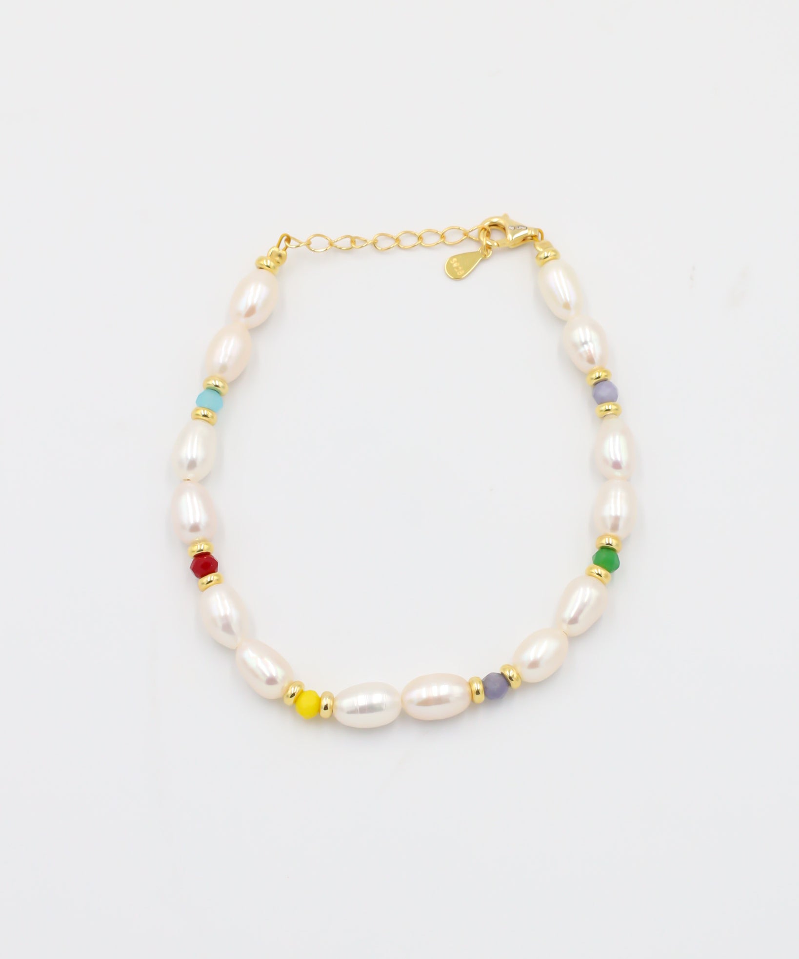 Adjustable gold-plated sterling silver pearl bracelet with colorful beads, Moe Gold, top view.