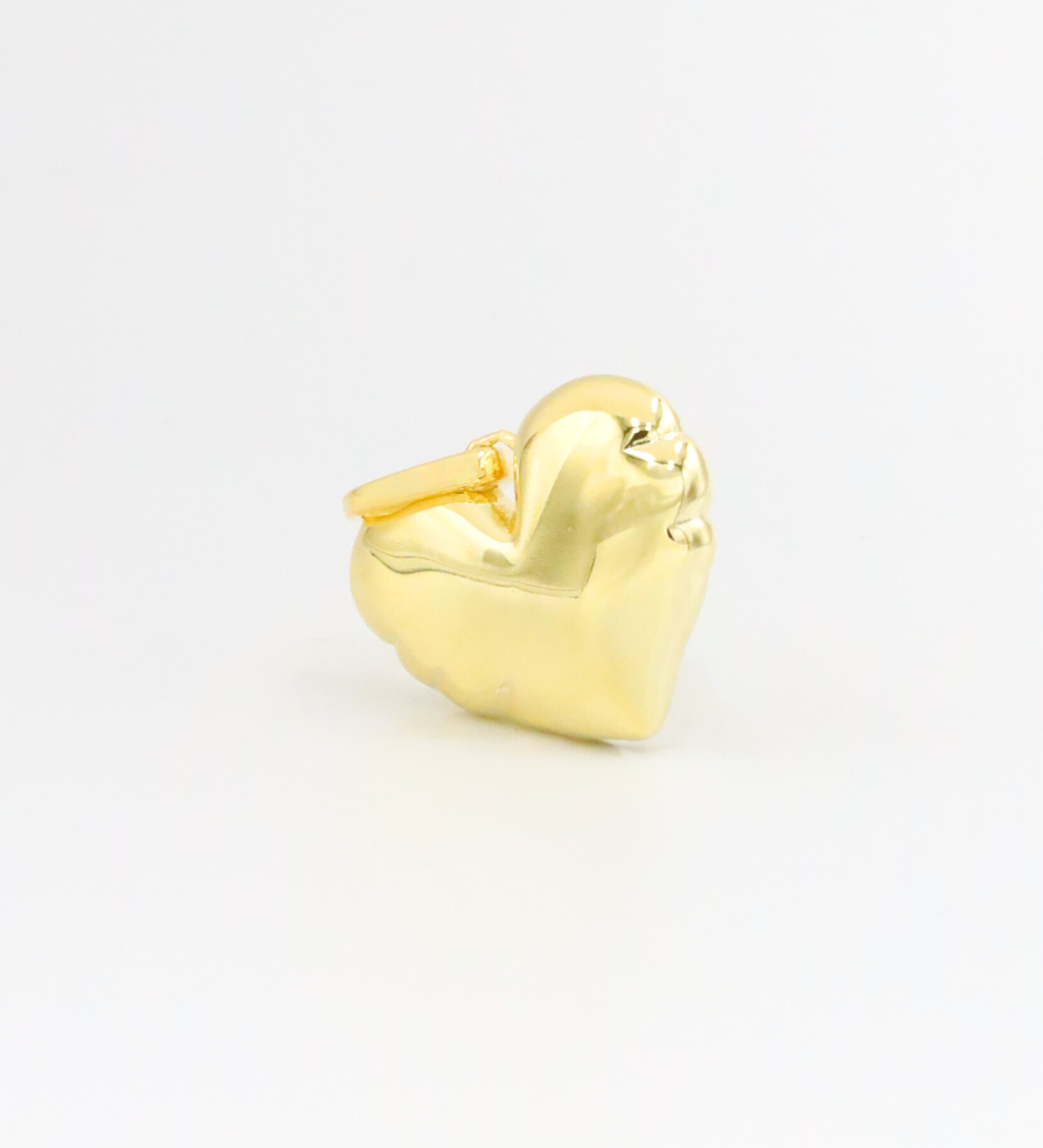 Side view of the Bella Gold heart pendant in gold-plated 925 sterling silver, displaying its smooth and rounded form.