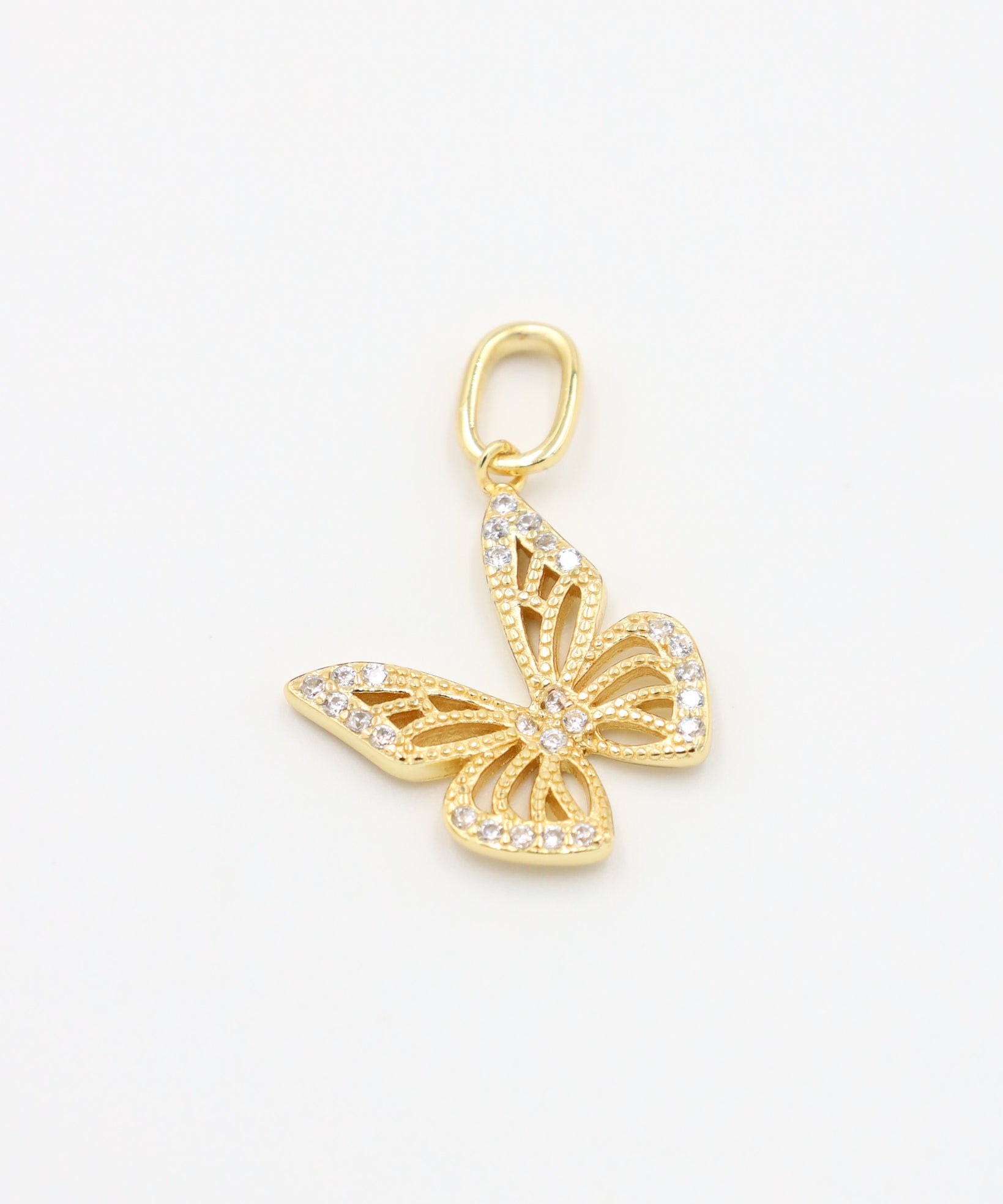 Front view of the Butterfly Gold pendant featuring intricate details with zirconia stones, made from gold-plated 925 sterling silver.