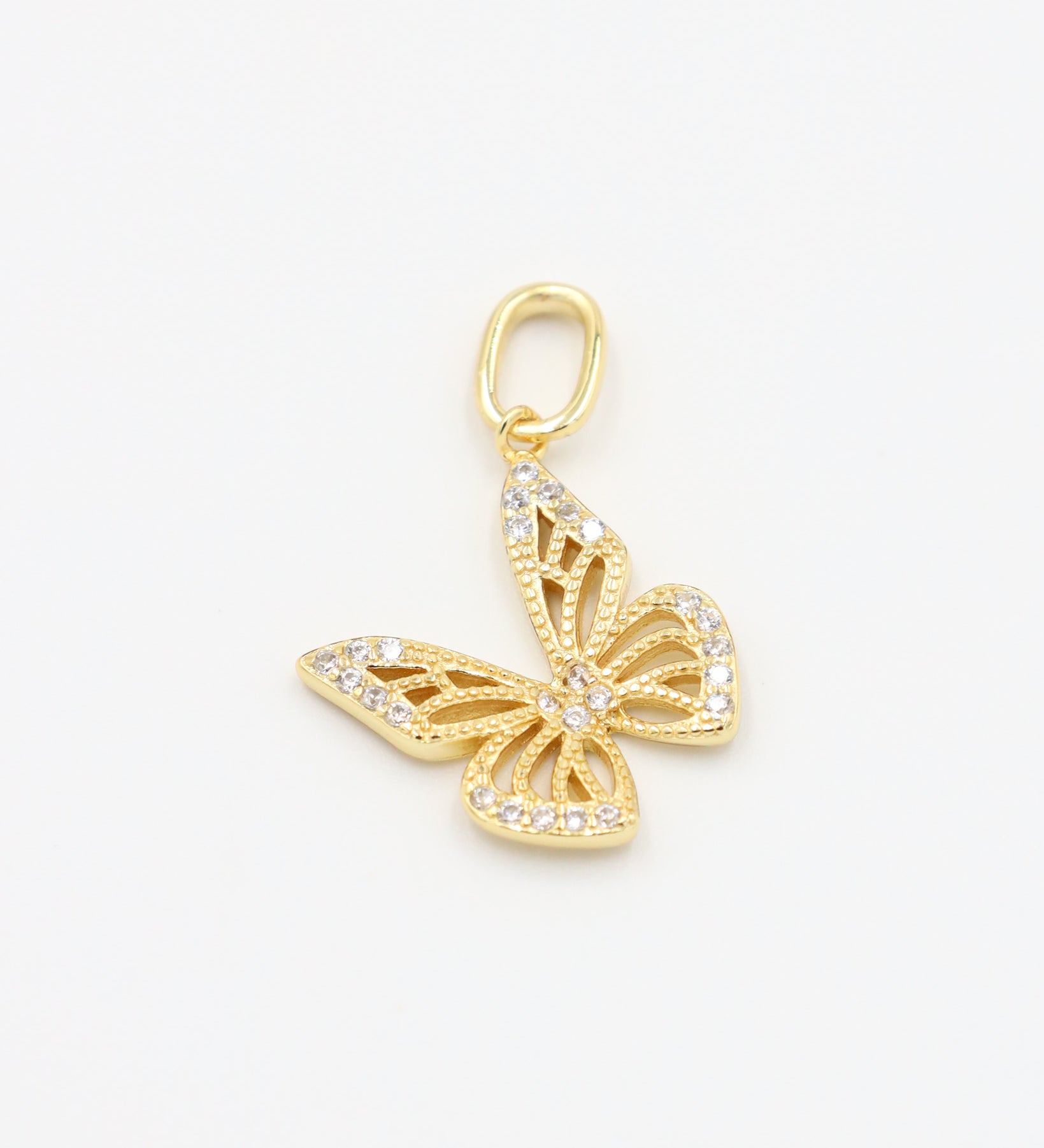 Front view of the Butterfly Gold pendant featuring intricate details with zirconia stones, made from gold-plated 925 sterling silver.