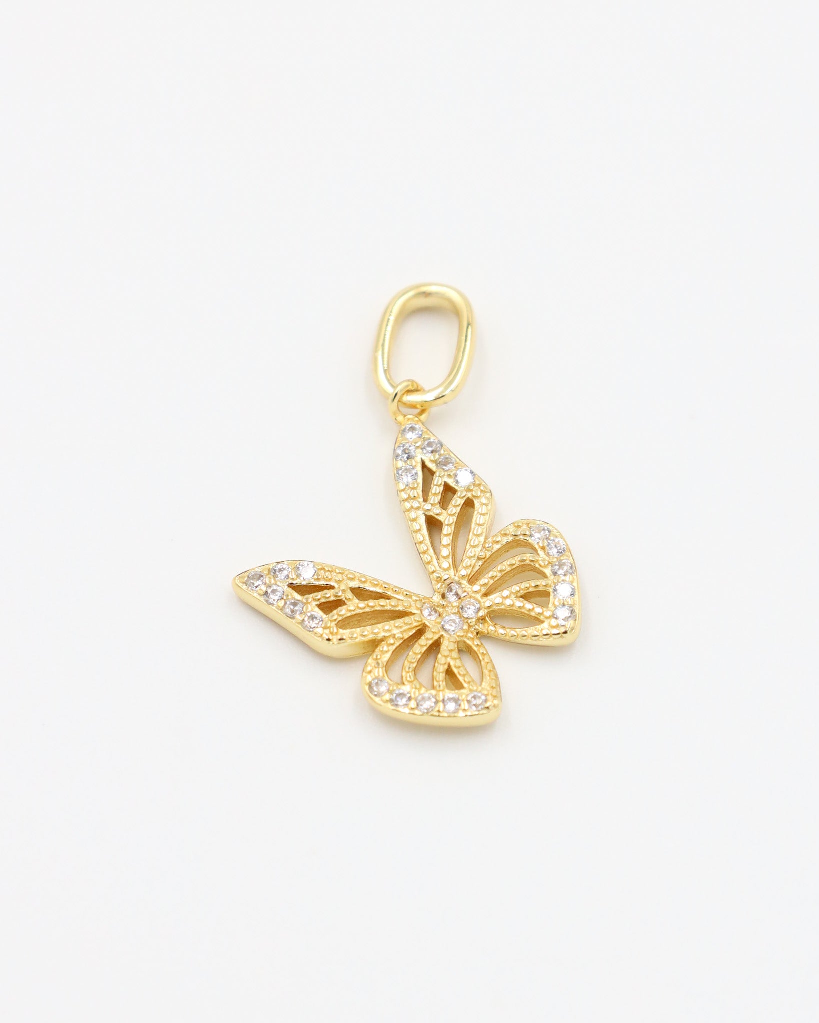 Front view of the Butterfly Gold pendant featuring intricate details with zirconia stones, made from gold-plated 925 sterling silver.