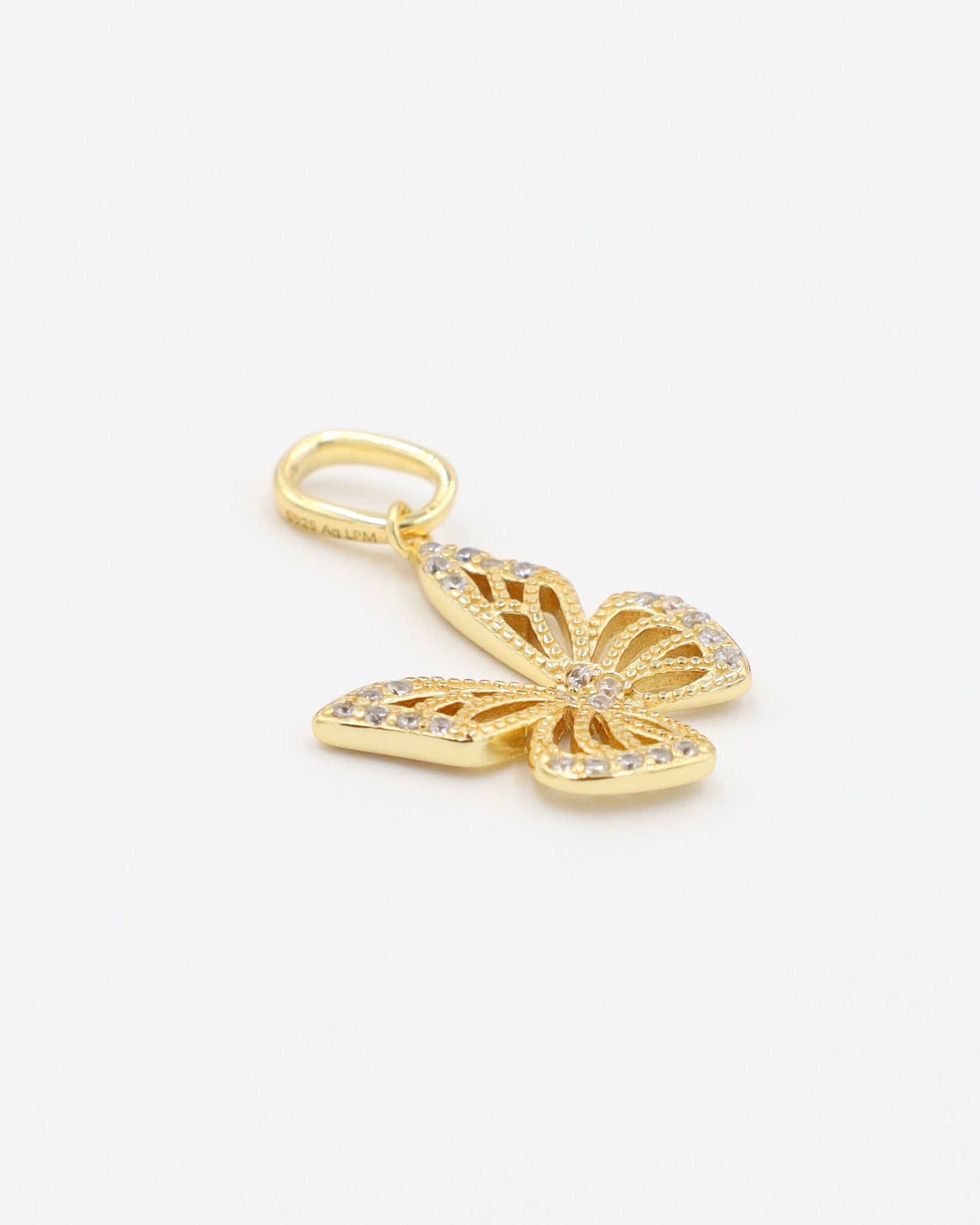 Side view of the Butterfly Gold pendant made from gold-plated 925 sterling silver with zirconia stones.