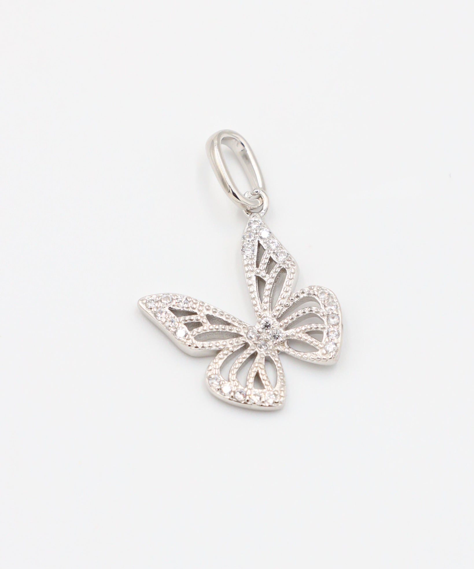 Top view of the Butterfly Silver pendant made from rhodium-plated 925 sterling silver, featuring intricate zirconia stone details.