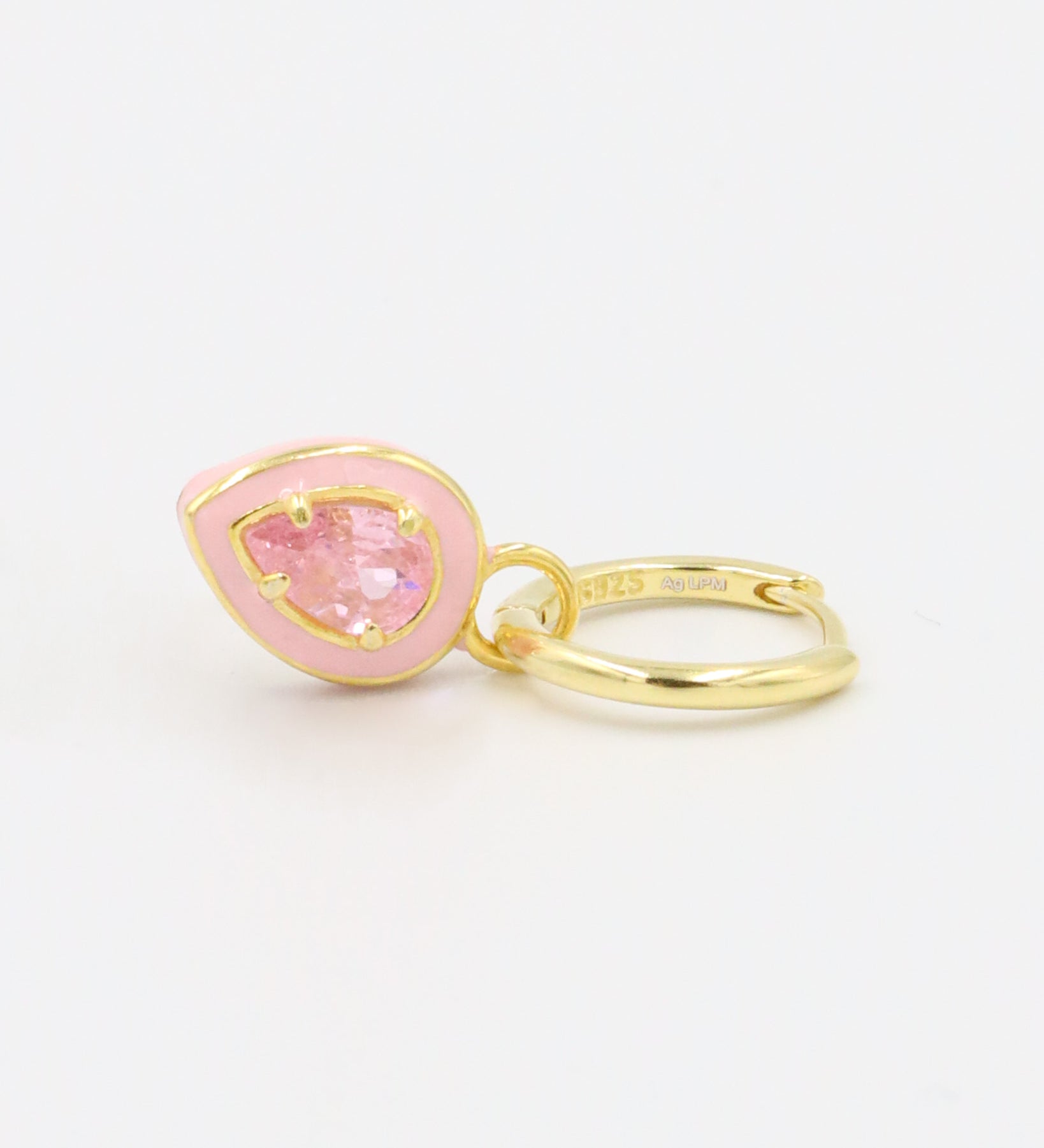 Single Cindy Pink earring showcasing the teardrop-shaped pink zirconia stone and enamel details, crafted in gold-plated sterling silver.