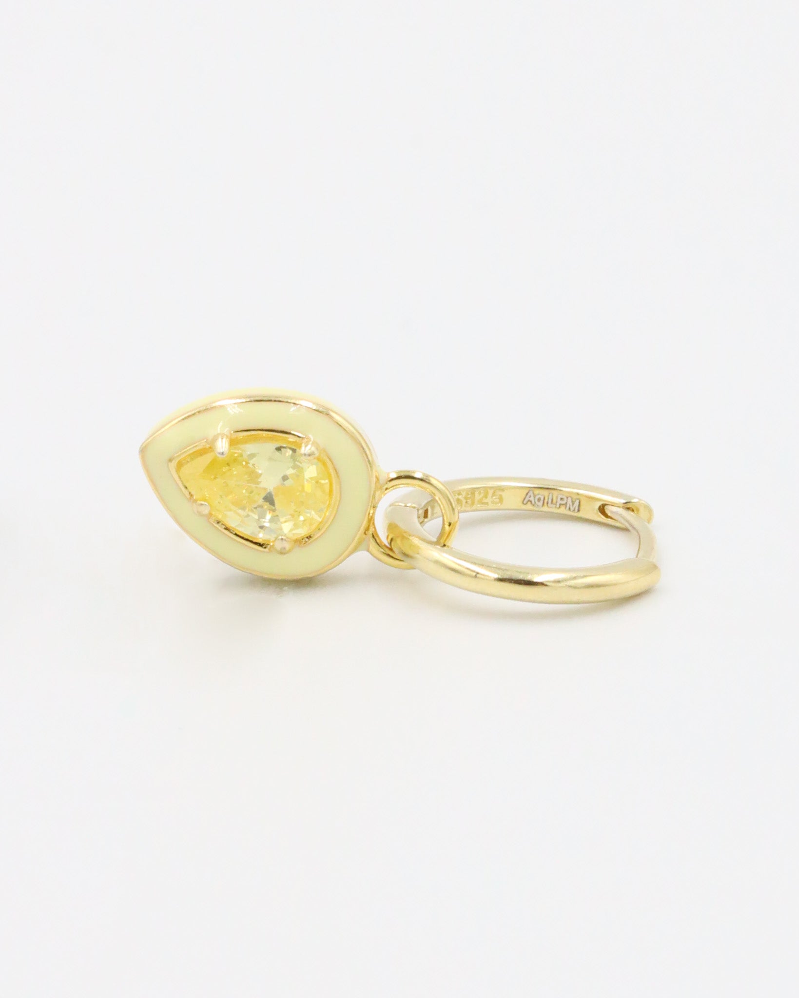 Single gold-plated sterling silver earring with a yellow zirconia stone and enamel detailing.