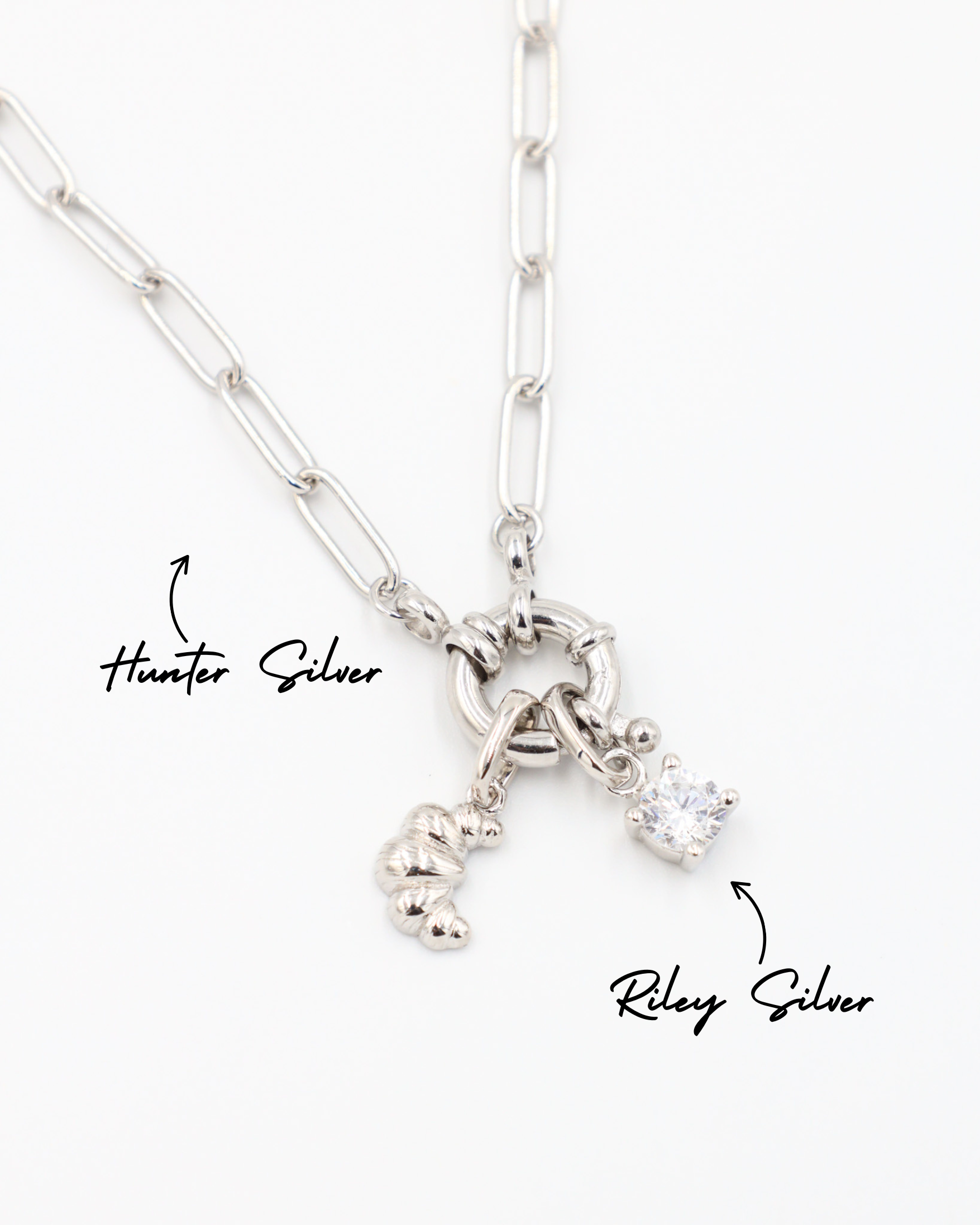Hunter Silver necklace with Croissant Silver pendant and Riley Silver pendant featuring a sparkling stone.