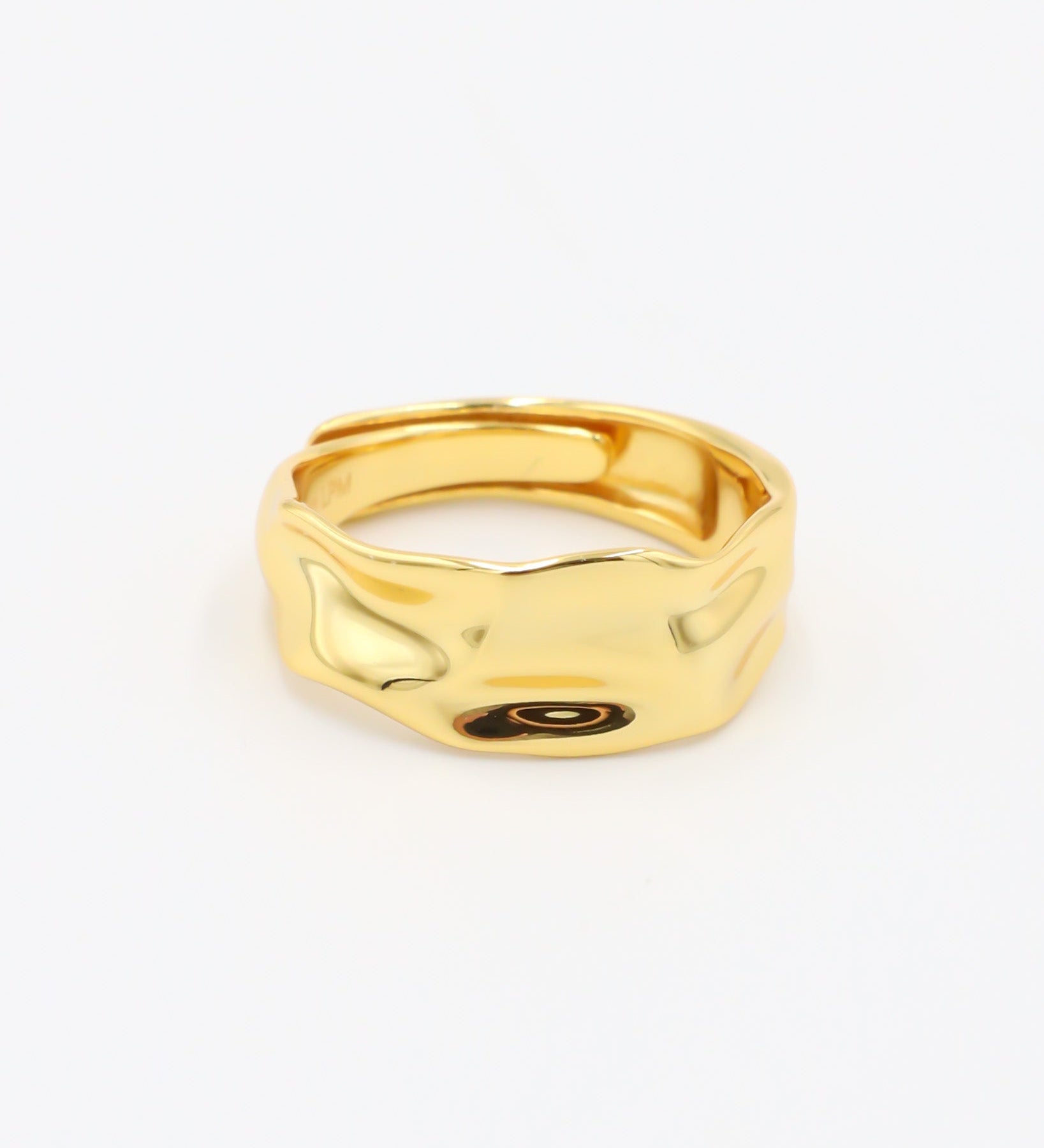Daphne - adjustable gold-plated sterling silver ring with wavy texture, minimalist design, front view.