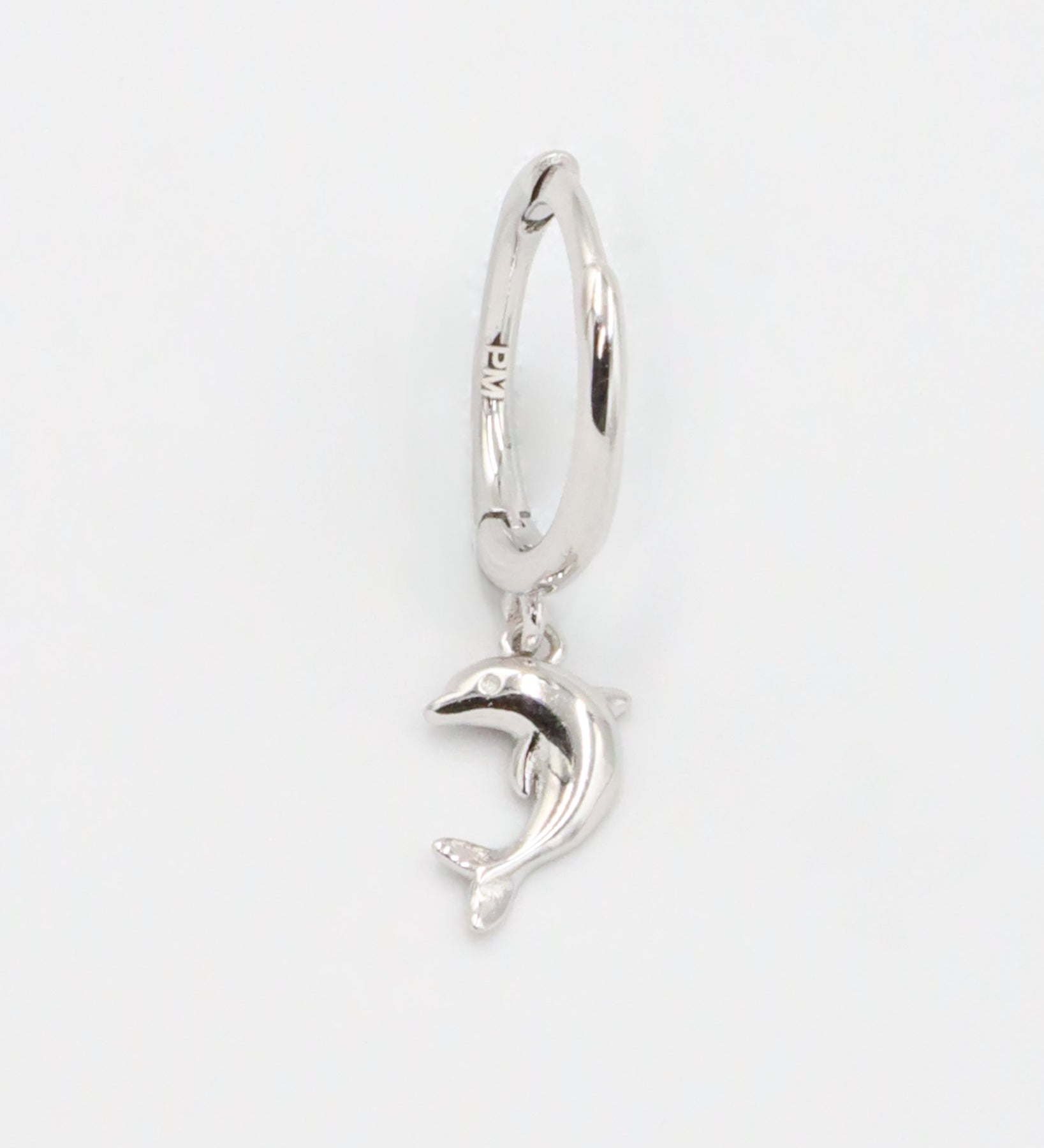 Left Dolphin Silver hoop earring featuring a dolphin charm.