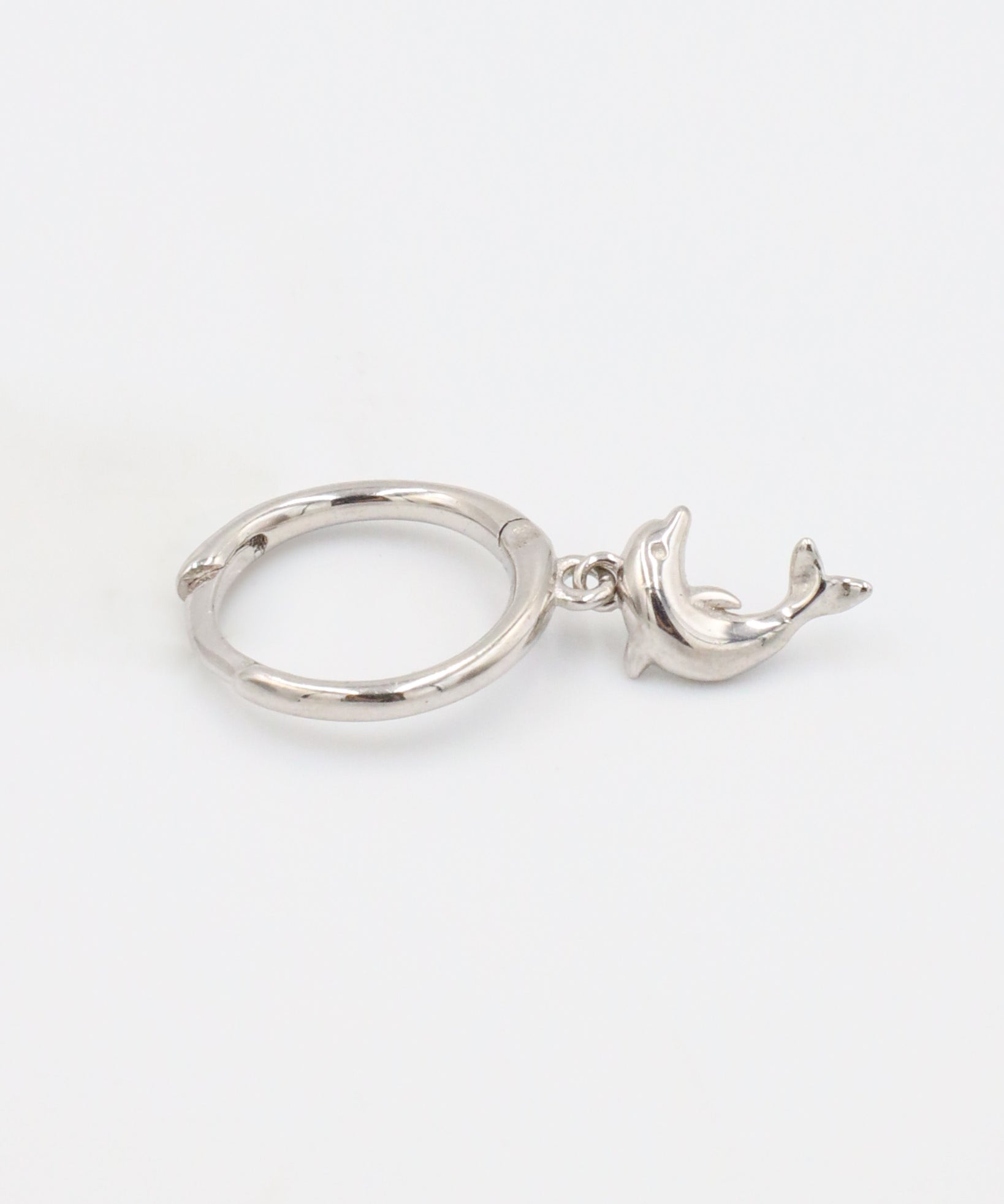 Right Dolphin Silver hoop earring featuring a dolphin charm.