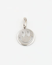 Flynn Silver pendant featuring a smiley face design crafted from rhodium-plated 925 sterling silver, shown from the front.