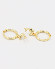 Pair of gold-plated sterling silver hoop earrings with dolphin charms, front view.
