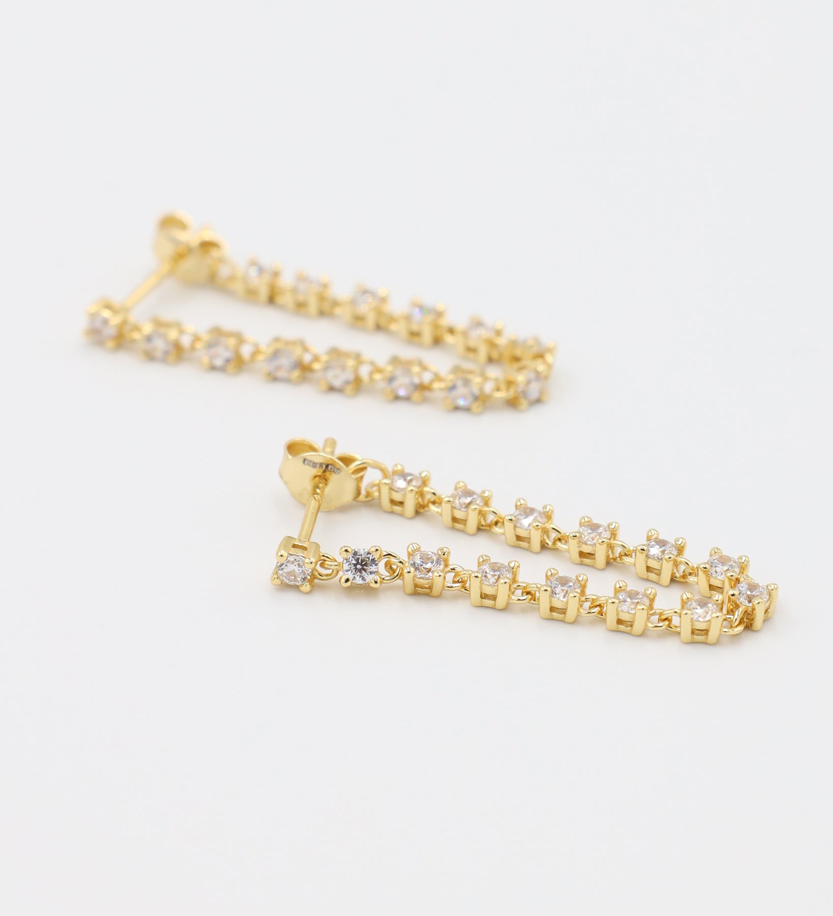 Close-up front view of Shannon gold-plated sterling silver stud earring featuring delicate zirconia stones.