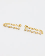 A pair of Shannon stud earrings in gold-plated sterling silver with sparkling zirconia stones.