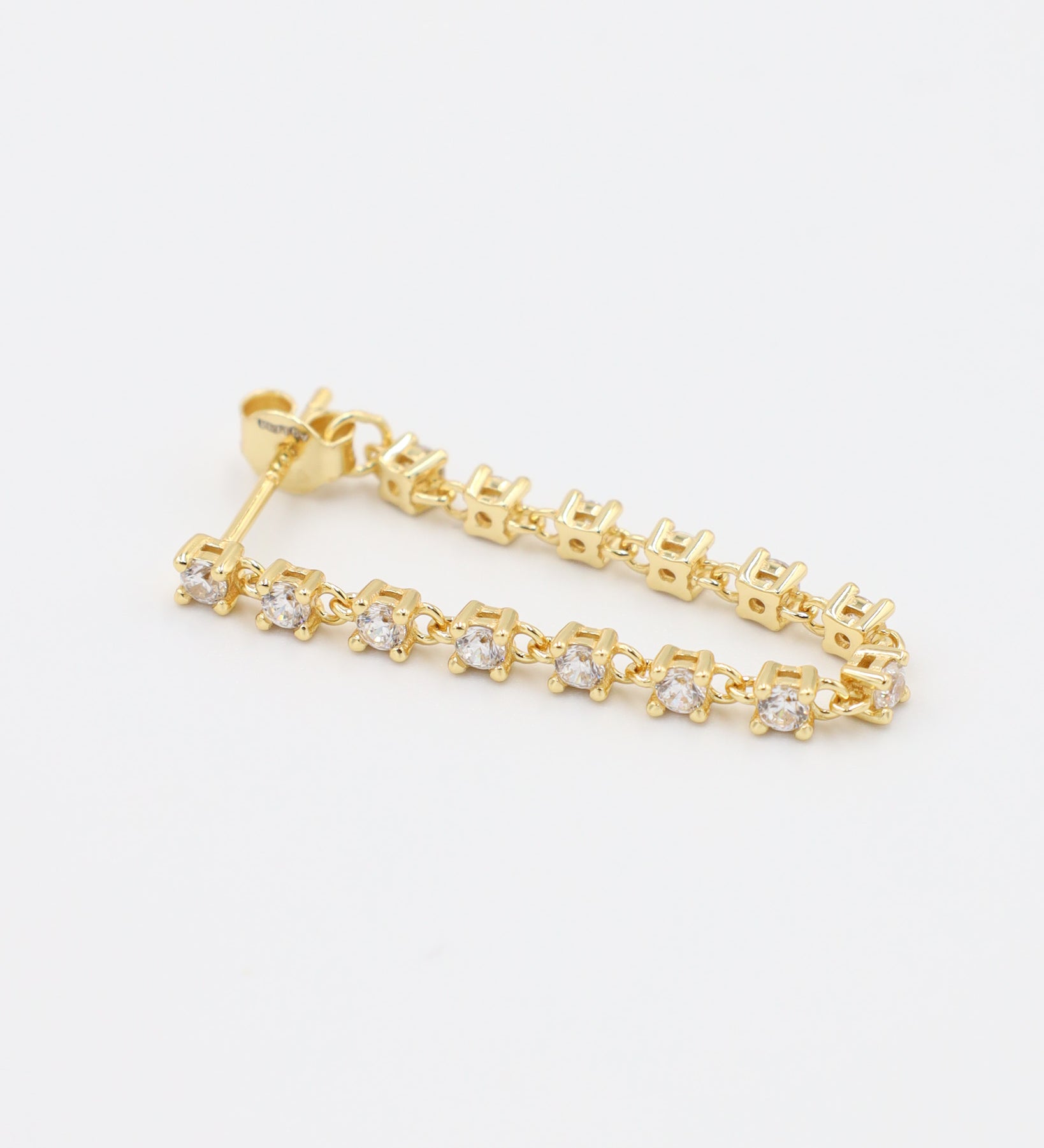 Side view of Shannon stud earring in gold-plated sterling silver with brilliant zirconia stones.