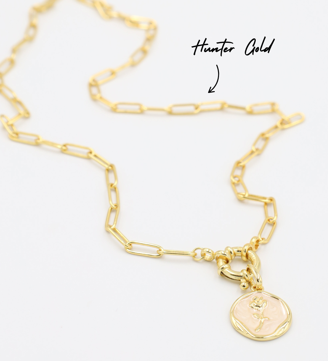 Gwendolyn Gold pendant with a flower design in soft enamel, elegantly paired with a gold-plated 925 sterling silver chain.