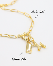 Hunter Gold chain necklace adorned with Sophia Gold pendant featuring a small heart detail and a Balloon Dog Gold pendant, all made of gold-plated 925 sterling silver.
