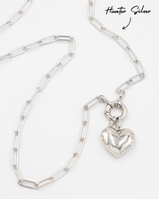 Hunter Silver chain necklace paired with the Bella Silver heart pendant, all crafted in rhodium-plated 925 sterling silver.