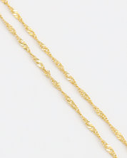 Detailed view of Jamie Gold necklace’s twisted rope chain in gold-plated 925 sterling silver.